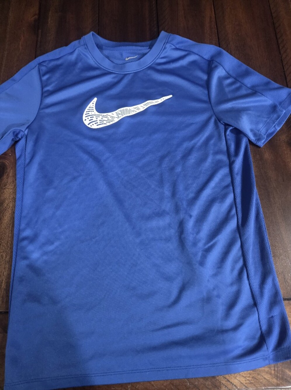 Nike youth large Blue Performance Tee with White nike swoosh Graphic